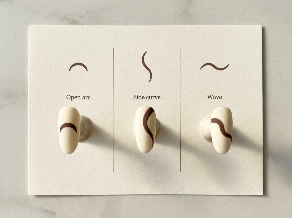 A practice board compares three curved chocolate strokes on cream nail tips.