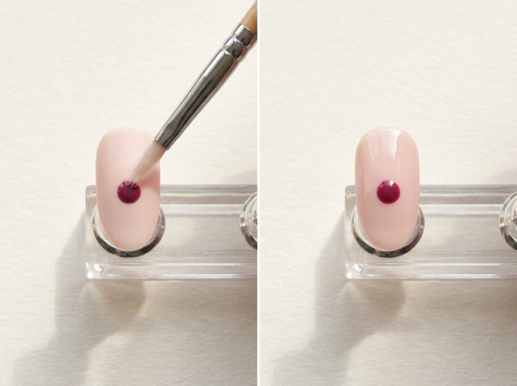A practice-nail demonstration illustrates a light brush pass over a small painted detail.